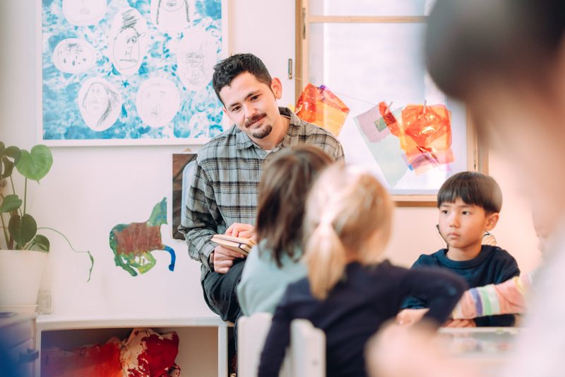 Children listening closely to a picture-book reading